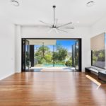 Inside the Home with Outdoor Pool — Pool Fencing in Benowa, QLD