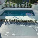 Top View of a Pool and Glass Frameless Pool Fence — Pool Fencing in Benowa, QLD