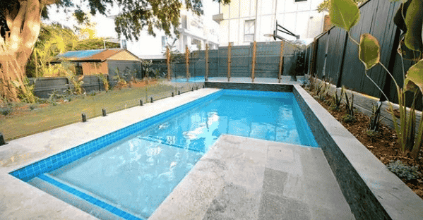 Pool with Frameless Glass Fence — Pool Fencing in Benowa, QLD