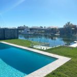 Pool with Glass Frameless Balustrades and Water Views — Pool Fencing in Benowa, QLD