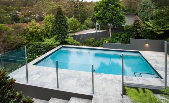 Glass Pool Fencing vs Aluminium Pool Fencing — Pool Fencing in Benowa, QLD