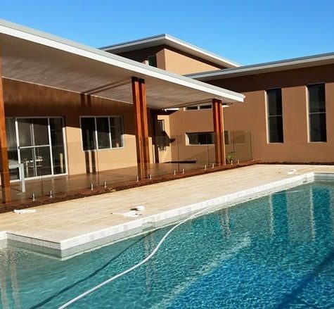 Residential House With Backyard Pool — Pool Fencing in Benowa, QLD