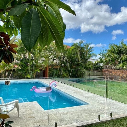 Concrete Pool With Floater — Pool Fencing in Benowa, QLD