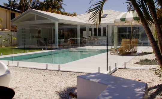 Modern Outdoor Pool — Pool Fencing in Benowa, QLD