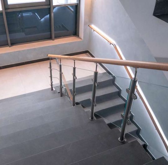 Modern House Design With Wood Handrail And Glass Balustrades